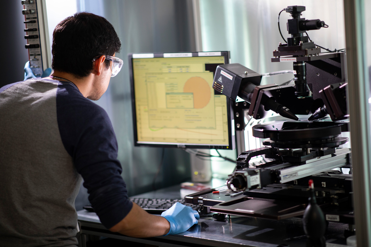 A student conducting research in a UAlbany nanotechnology lab.
