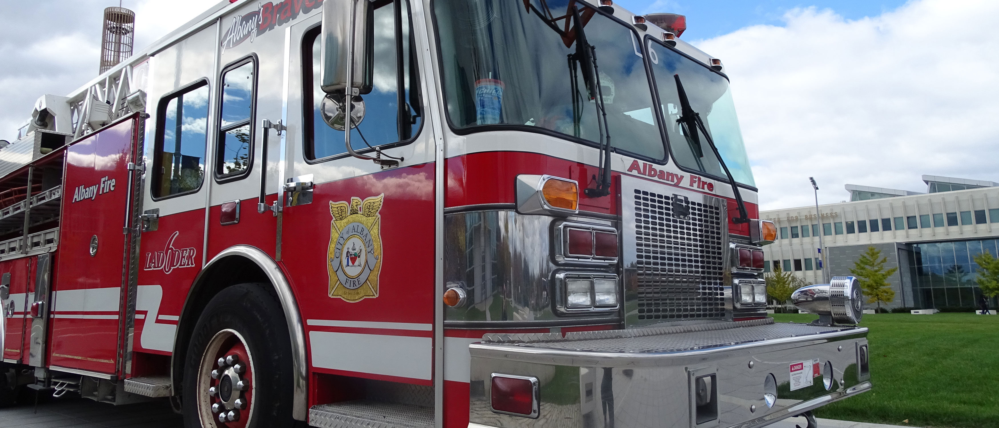 An Albany City Fire truck parked on campus on a sunny day.