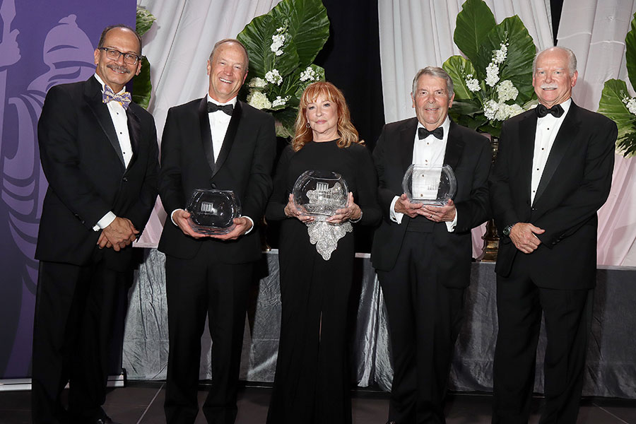 UAlbany President Rodriguez and Foundation President Hearst stand with the laureates at the ceremony after they have received their awards.