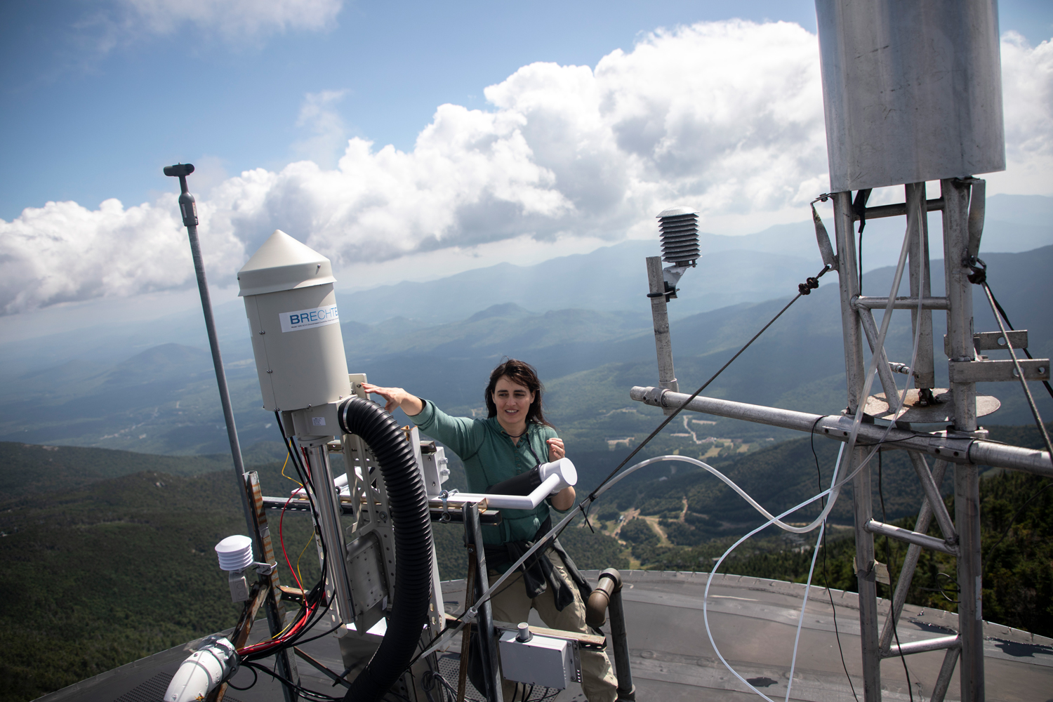 A UAlbany researcher working at the Whiteface Mountain summit weather station.