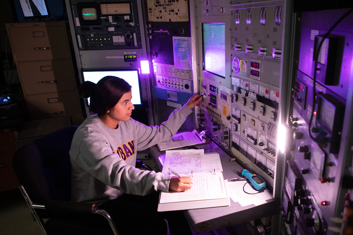 A student conducts research using UAlbany's linear accelerator.
