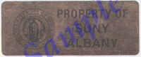 A sample of a New York State property tag. This tag is brownish gold, with the UAlbany logo and the words "Property of SUNY Albany."