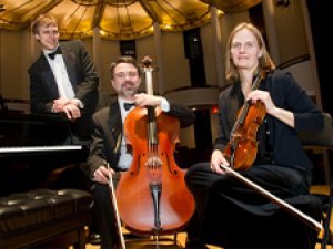 The members of Capital Trio pose with their instruments.