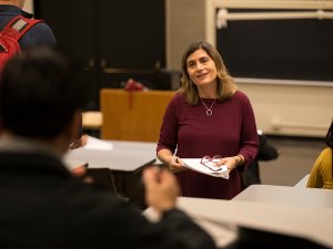 Erin Bell delivering a lecture in 2018