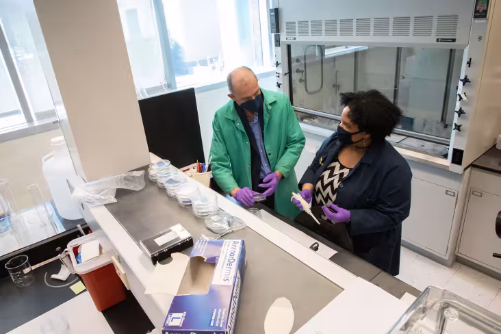 Two researchers working in a lab together.
