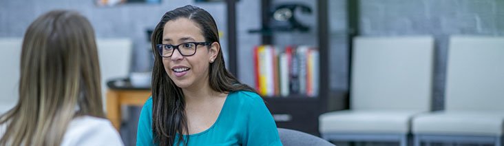 Therapist and client having a discussion.