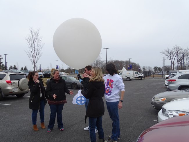 Students releasing a weather baloon