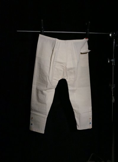 A man's white linen pants.