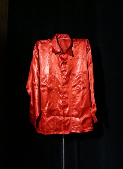 A man's red silk shirt.