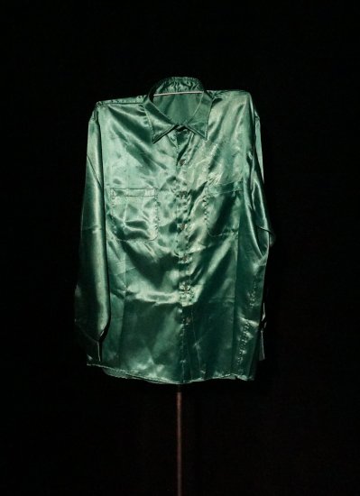 A man's green silk shirt.