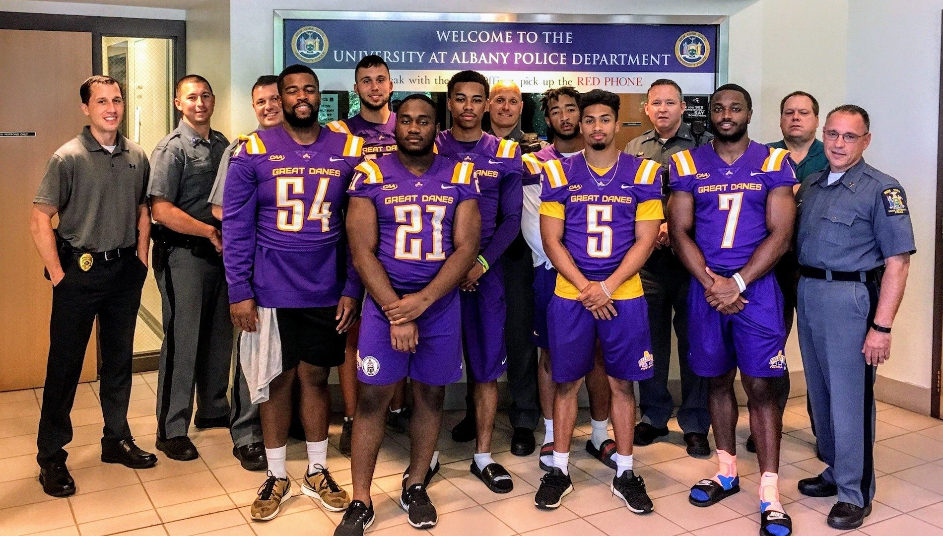 UPD Officers with UAlbany football team