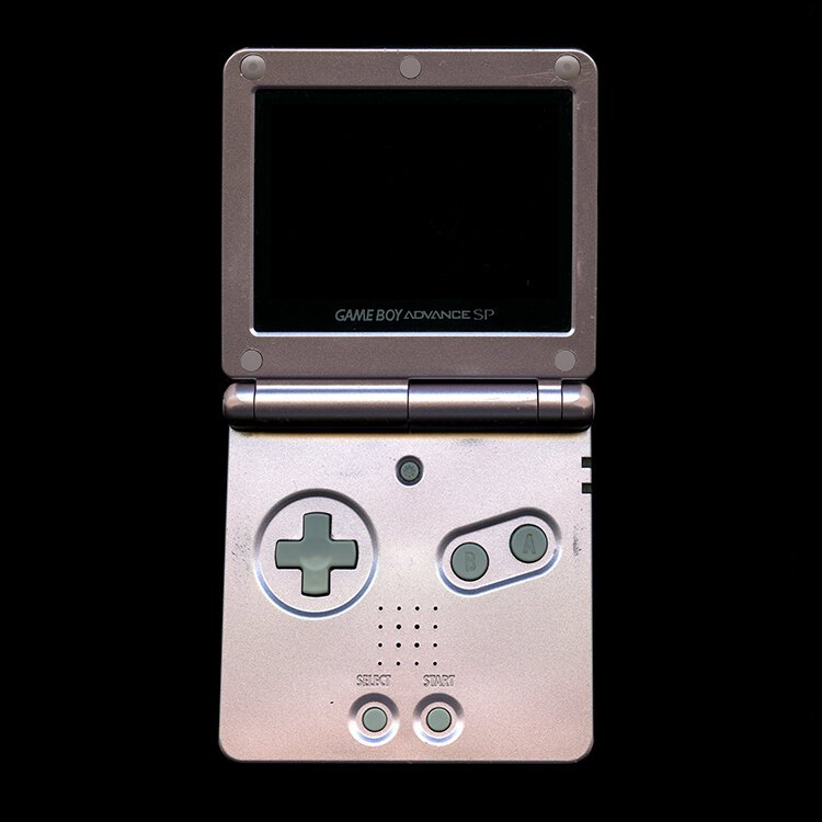A silver Game Boy Advance. 