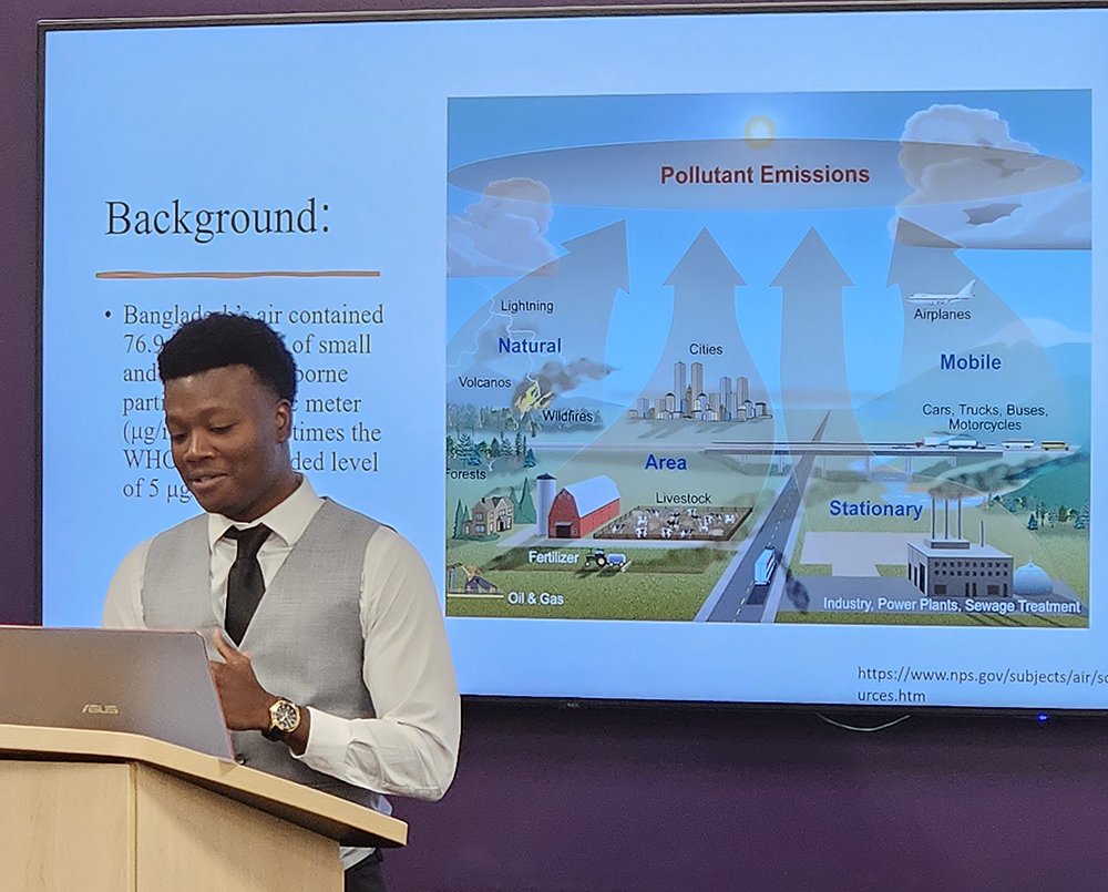 UAlbany senior Eugene Marco of Md. Anyul Bari's summer research team presents at ETEC.