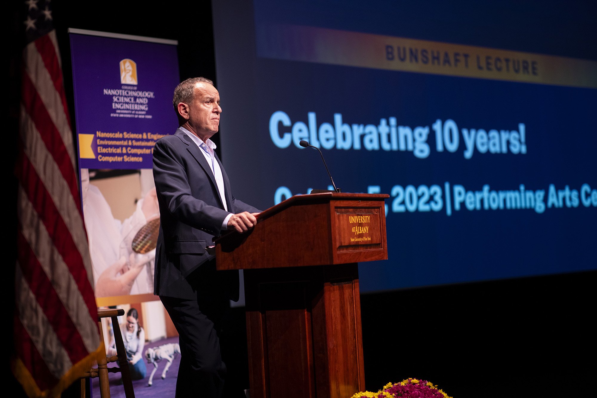 Albert Bunshaft '80 introduces former NASA Astronaut Leland Melvin at the 10th Annual Bunshaft Lecture at UAlbany's Performing Arts Center.