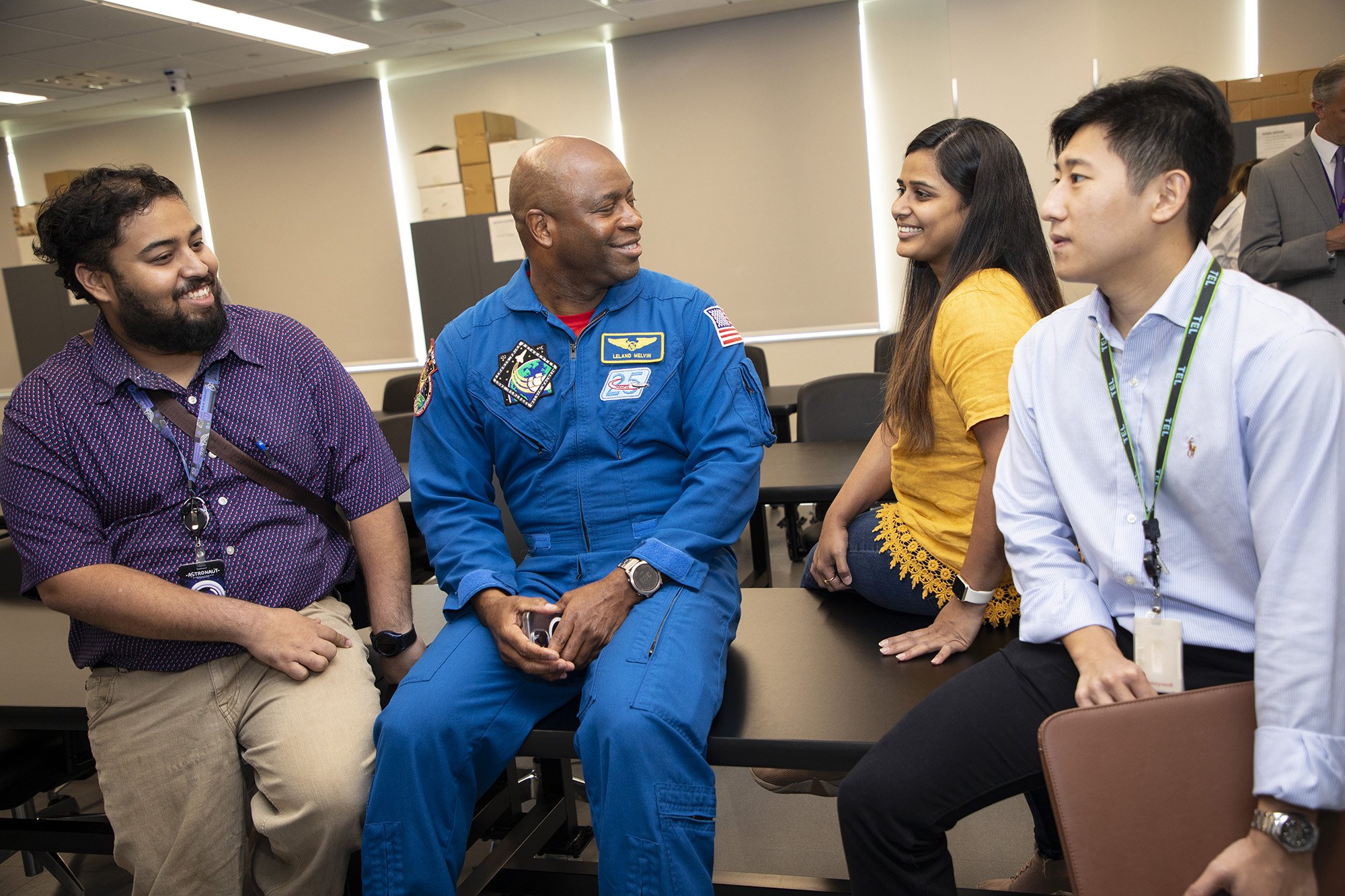 Former NASA Astronaut Leland Melvin with students at the College of Nanotechnology, Science, and Engineering.