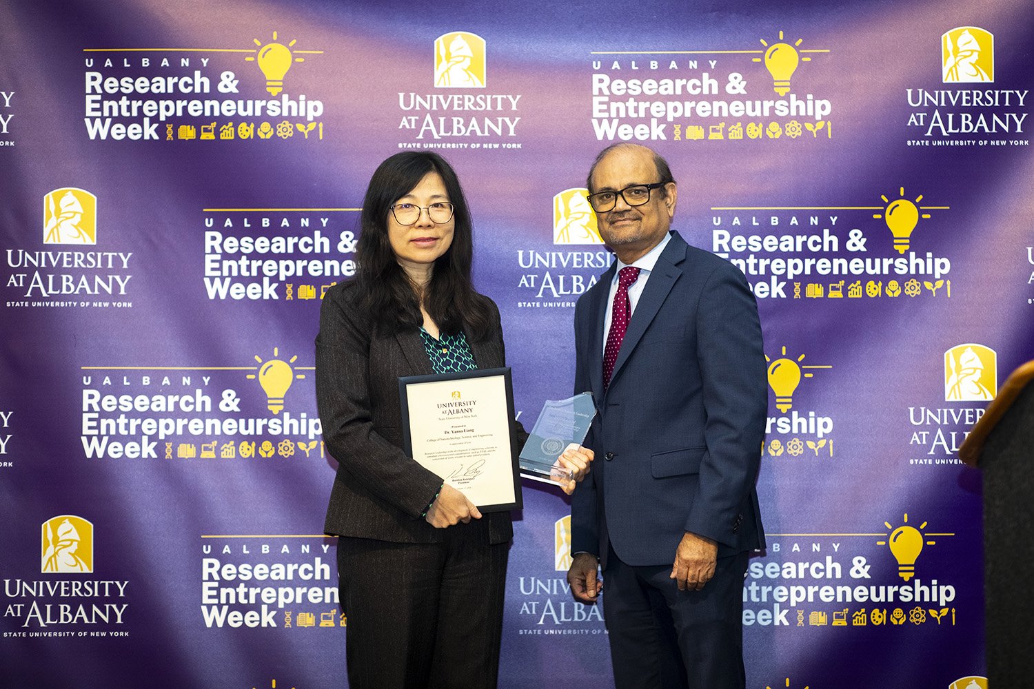 Professor Yanna Liang with Vice President for Research and Economic Development Thenkurussi (Kesh) Kesavadas.
