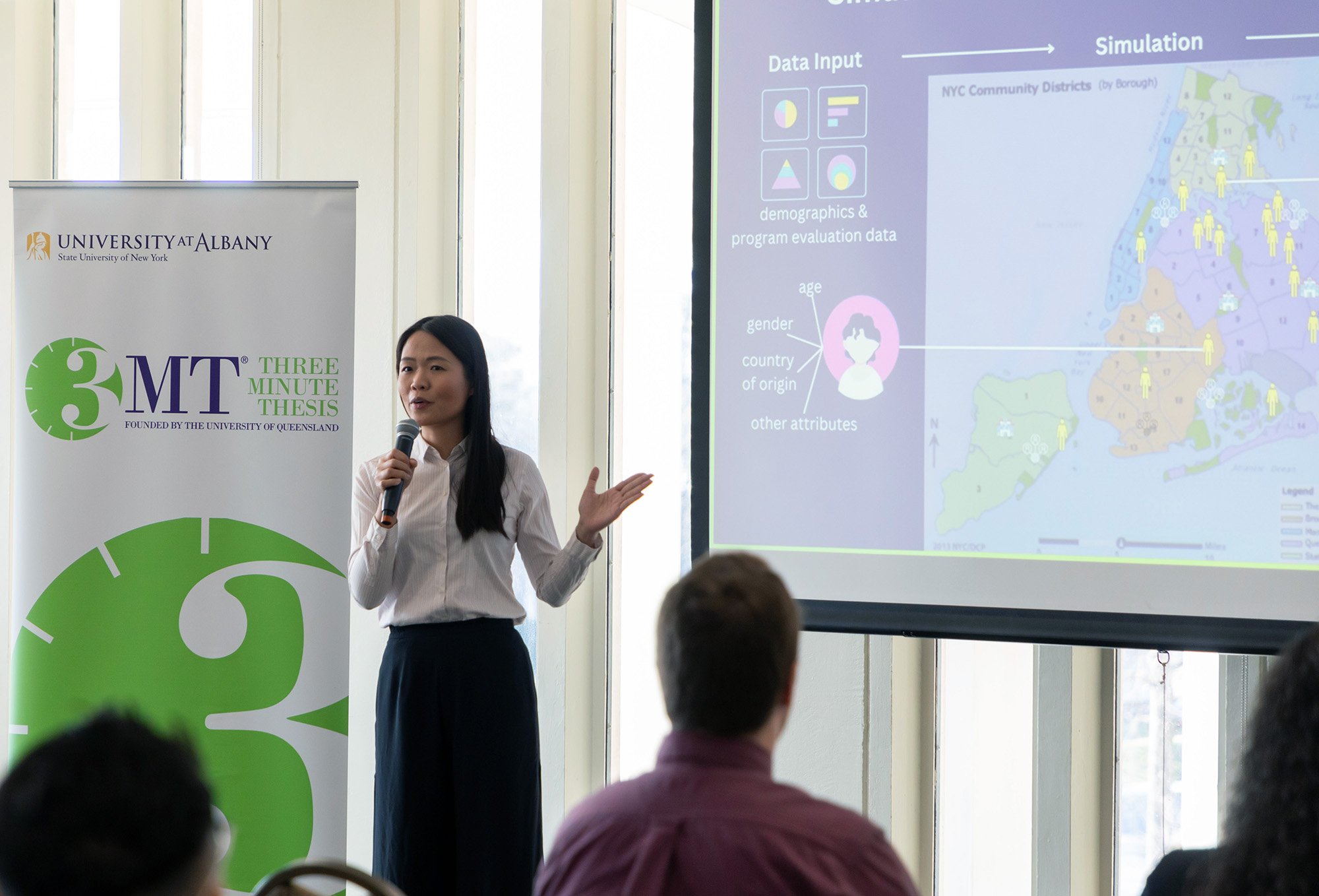 Charlotte Huang, a doctoral student in public health, presents at the 3-Minute Thesis finals.