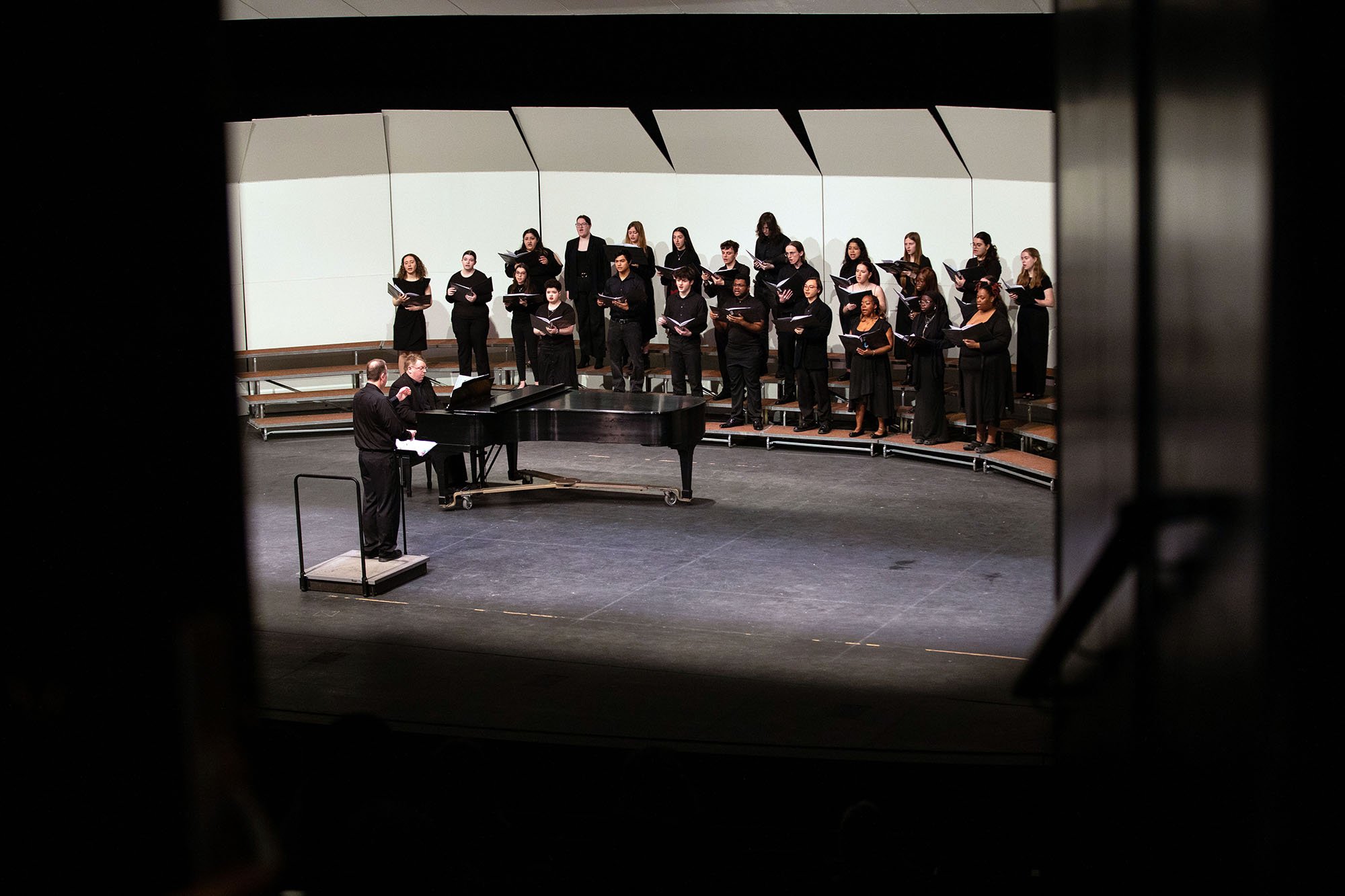 UAlbany choral singers give a performance onstage during Showcase Day 2024.