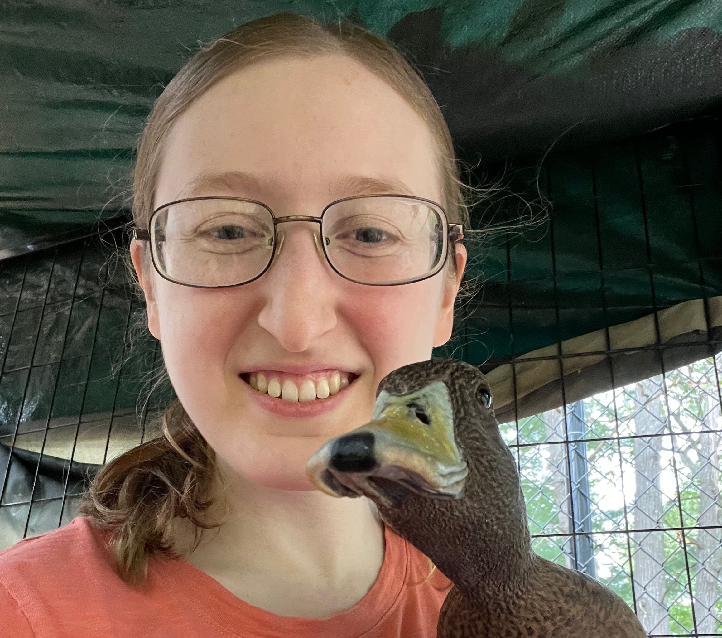 Alissa Moeller takes a selfie with a duck.
