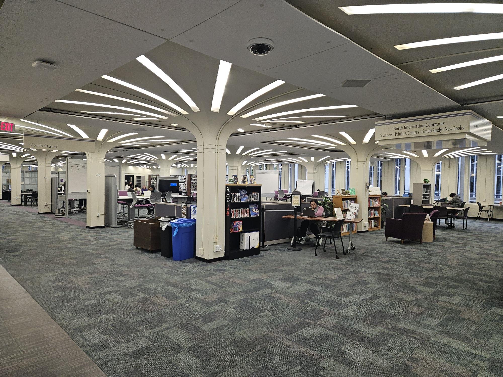 The North Information Commons inside the University Library, which contains scanners, printers, copiers, group study areas and new books.