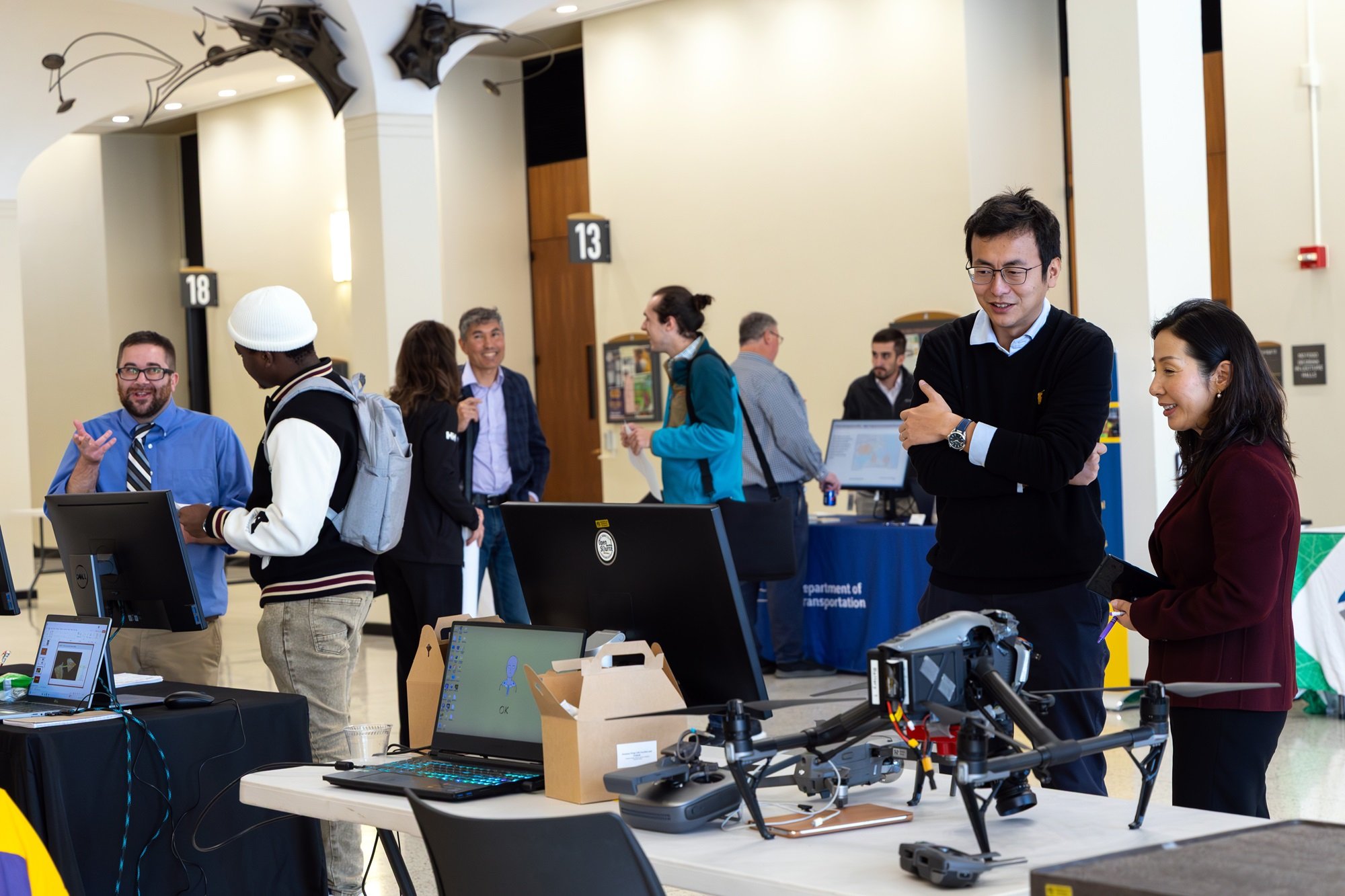 People gather at UAlbany's GIS Day celebration.