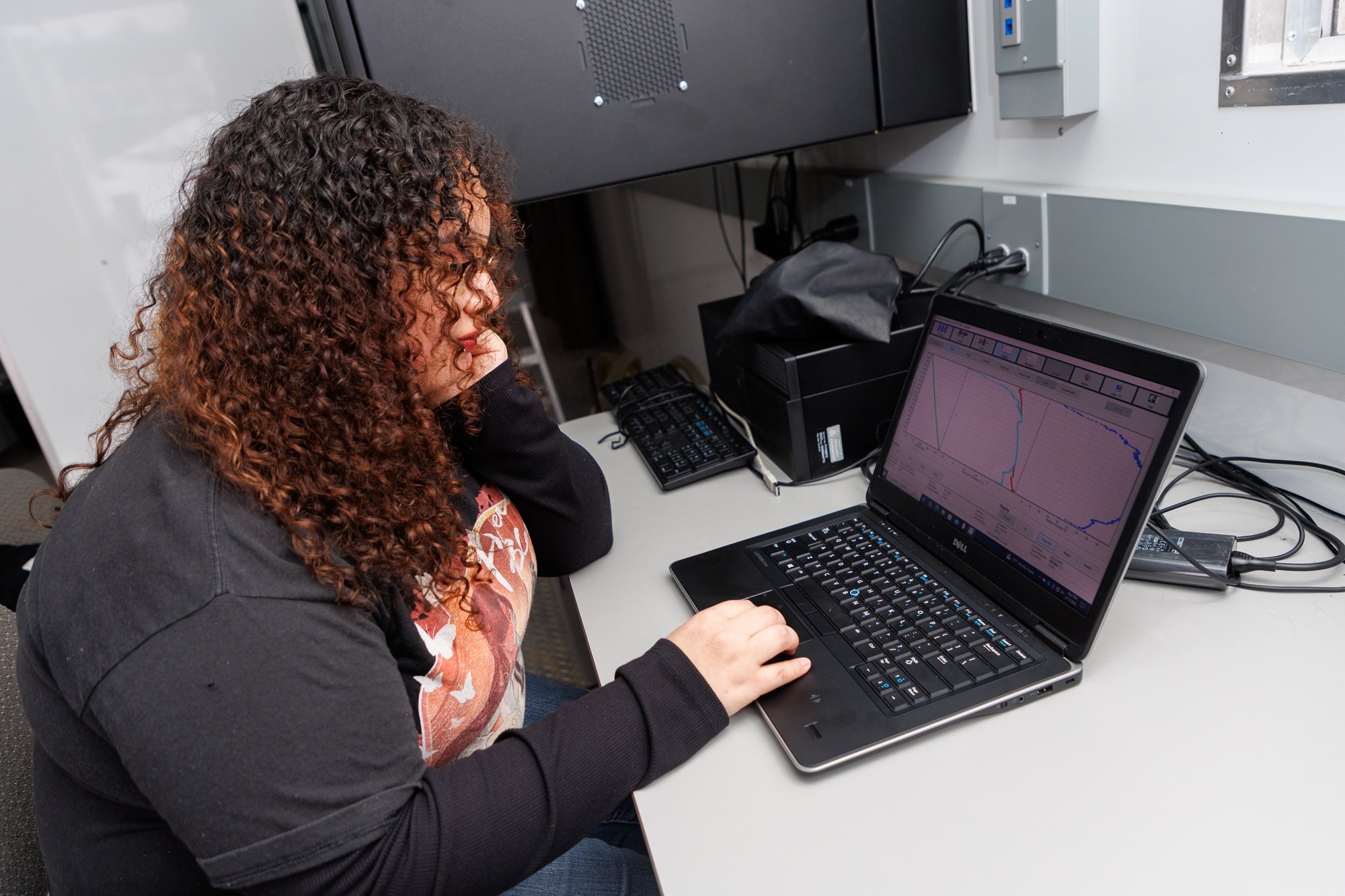 UAlbany student Emely Martinez-Pichardo reviews data following a weather balloon launch.