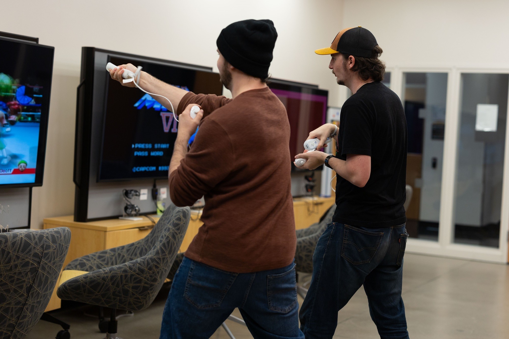 Students play with the Nintendo Wii inside the Game Hub.