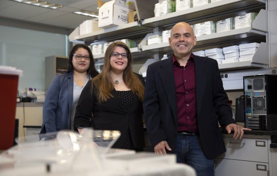 UAlbany Psychology Professor Andrew Poulos is studying the mental pathways to fear by sex and age differences with PhD students Natalie Odynocki and Lorianna Colon, at the University at Albany’s Life Sciences Building, on Wednesday, May 29, 2019. (photo by Patrick Dodson)
