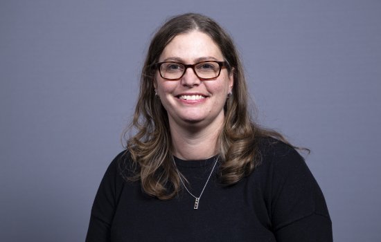 Dr. de Long smiles at the camera.