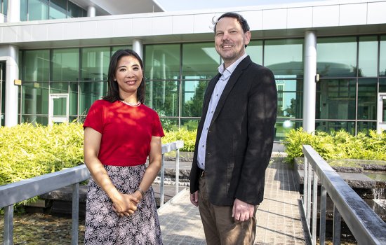Microbiologists Cheryl Andam and Alex Valm in the UAlbany Life Sciences Building courtyard