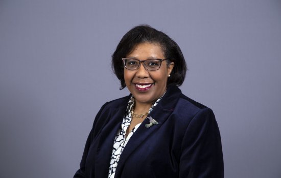 Julia Hastings smiles at the camera.