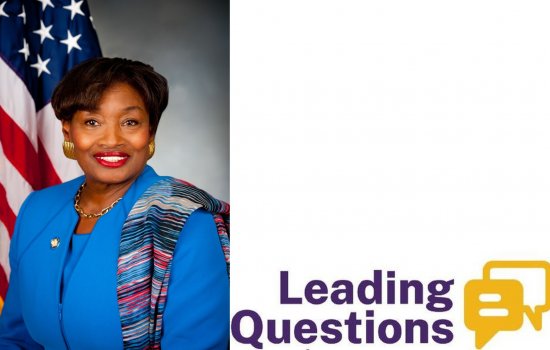 Photo of a smiling Andrea Stewart-Cousins in a bright blue suit in front of a U.S. flag, next to a logo reading Leading Questions