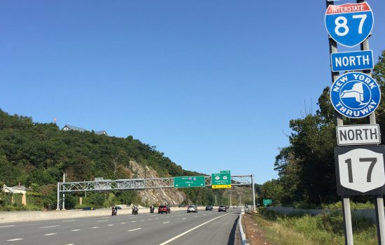 A highway in New York State during the daytime