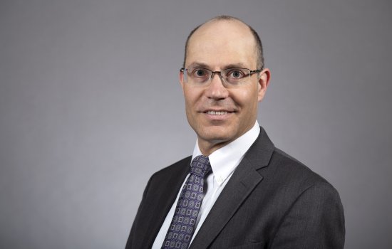 Headshot of Gary Ackerman, associate professor at CEHC.
