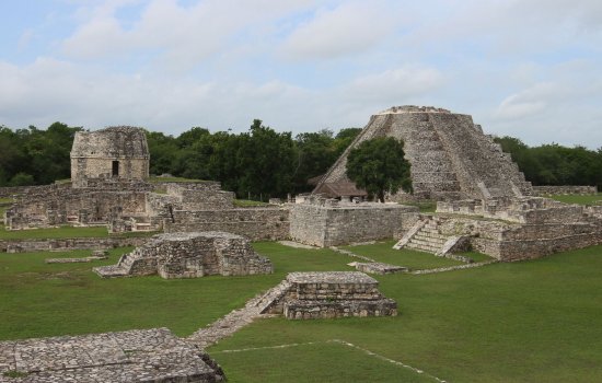 Square and pyramid shaped stone ruins of the ancient Mayapan city