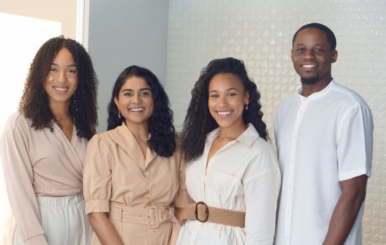 MyLUA health team members stand indoors.