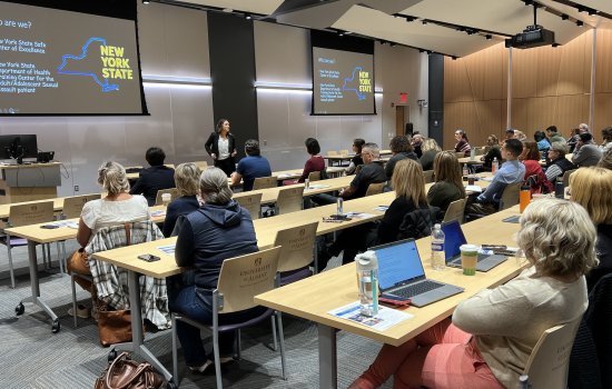 Attendees watch a presentation during the Pediatric Emergency Preparedness seminar inside ETEC's first floor meeting room.