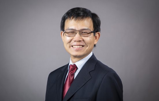 A portrait of Kai Zhang.