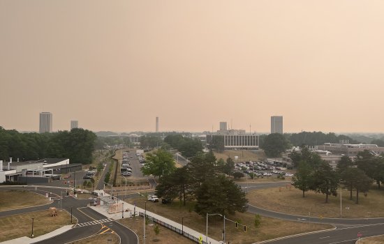 An orange-colored, smoky haze covers the sky above UAlbany's Uptown Campus.