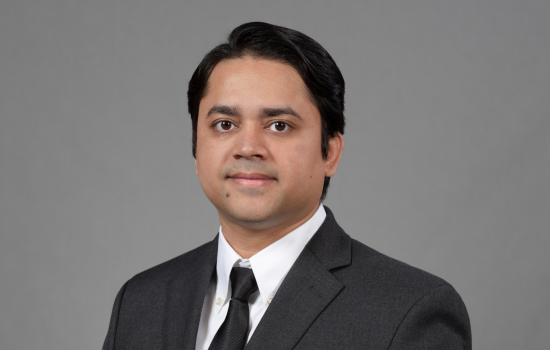 A portrait of Muntasir Masum.