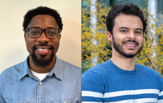  This composite image features two side by side headshots. Emmanuel Edem Adade is at left. Smiling, with a short beard, he is wearing black rectangular-rimmed glasses and a blue denim button down shirt. At right, Jesus Frias smiles in a blue sweater with white stripes. A tree with yellow blossoms is in the background. 