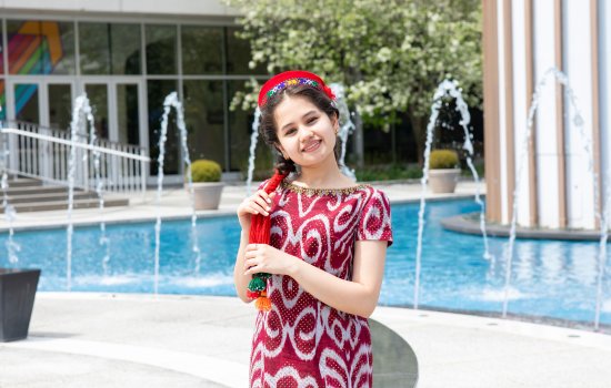 Graduate student Aziza Alimardonova poses in her Tajikistan dress.
