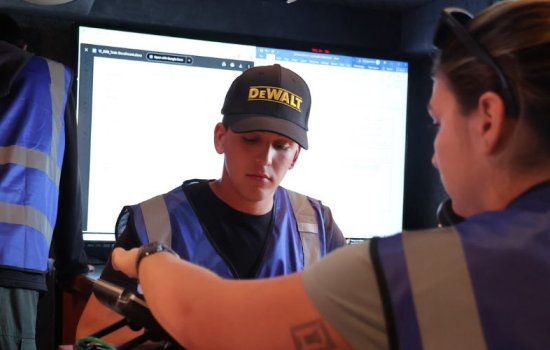 CEHC student Ethan Maier working with emergency management equipment along with another student.