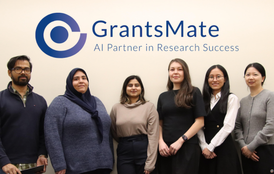 Six people stand in a row beneath the GrantsMate logo with the tagline "AI Partner in Research Success" on a plain white background.