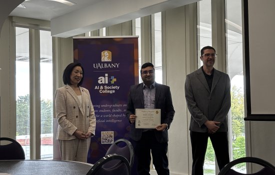 Karan Bashin receiving AI & Society Dissertation Fellowship
