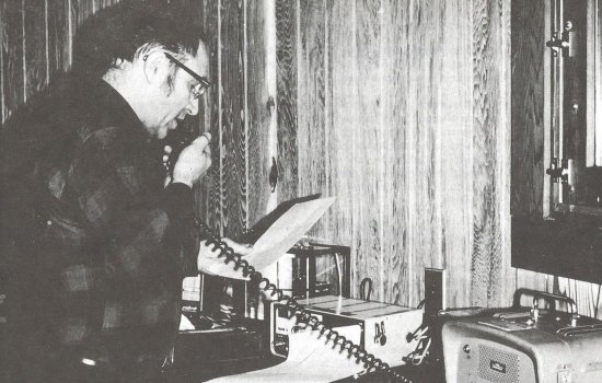 Ray Falconer gives his radio weather forecast from inside the Whiteface Mountain Field Station.