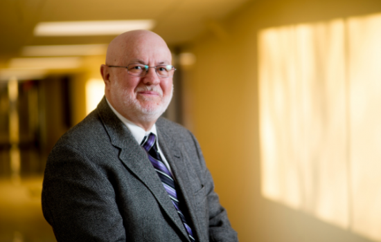 Phil Nasca smiles at the camera.