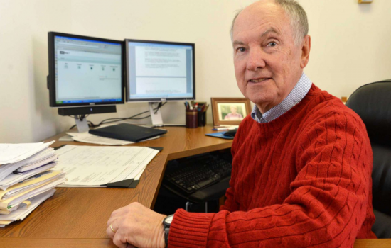 Man smiling at the camera.