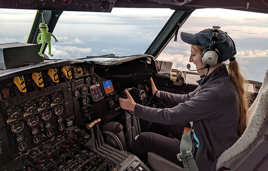 DAES student Emily Paltz flies Kermit – the NOAA42 P-3 Hurricane Hunter – during the OTREC field campaign. (Photo by Brian Richards)