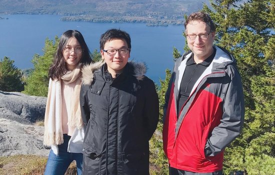 Jeffrey Braunstein on a hike up Buck Mountain with two of his undergraduate assistants. 